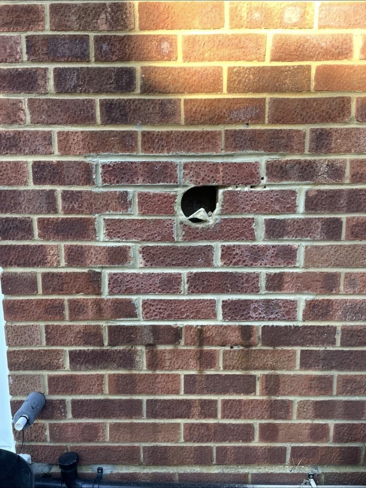 Spalled brick faces, crumbling or flaking off