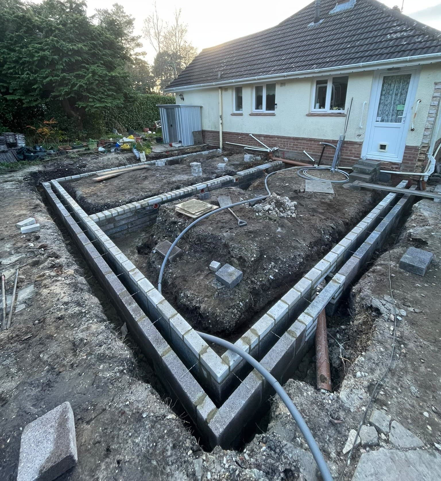 Blockwork footings going in along a trench
