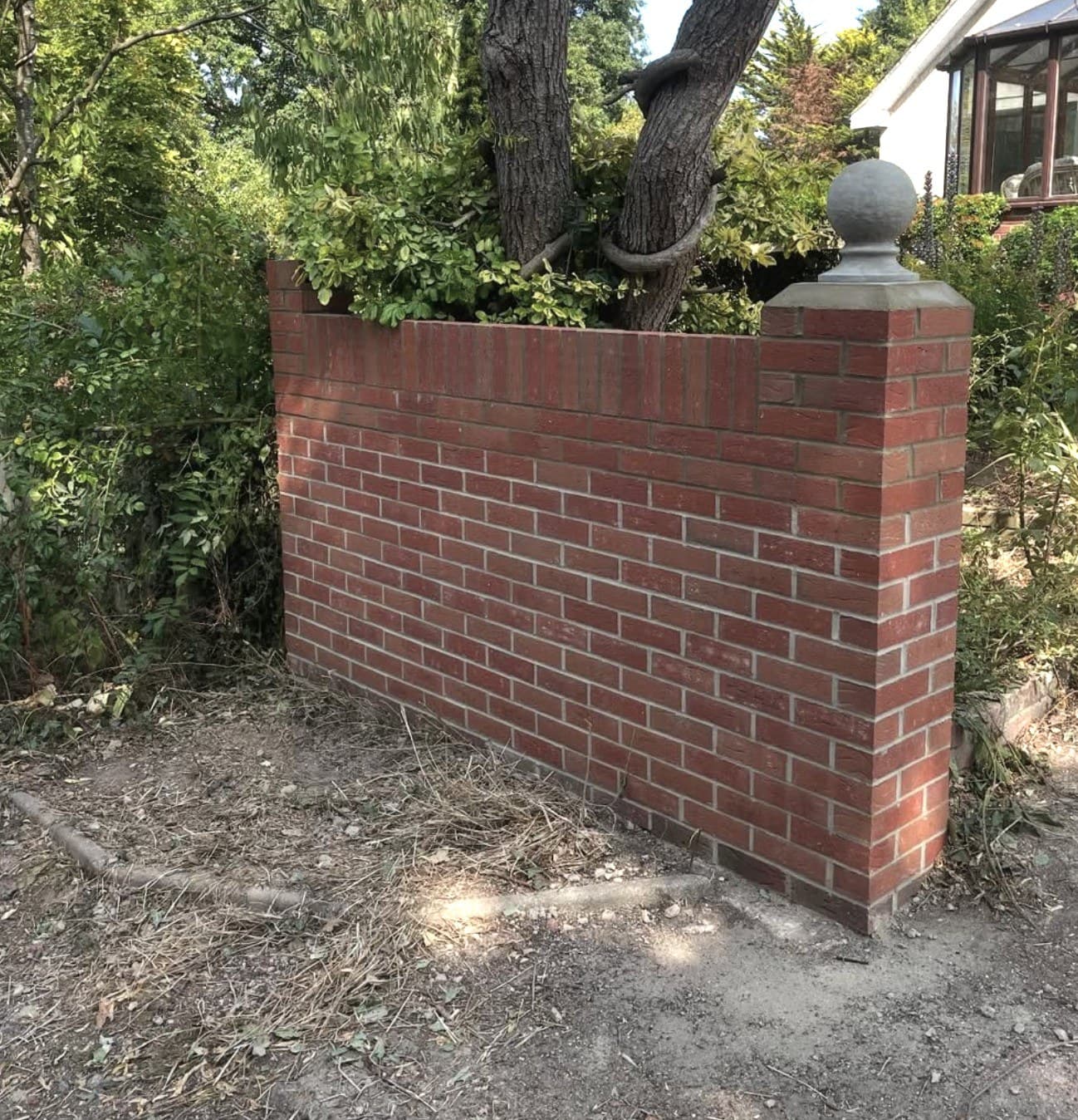 Garden wall new red brick pier