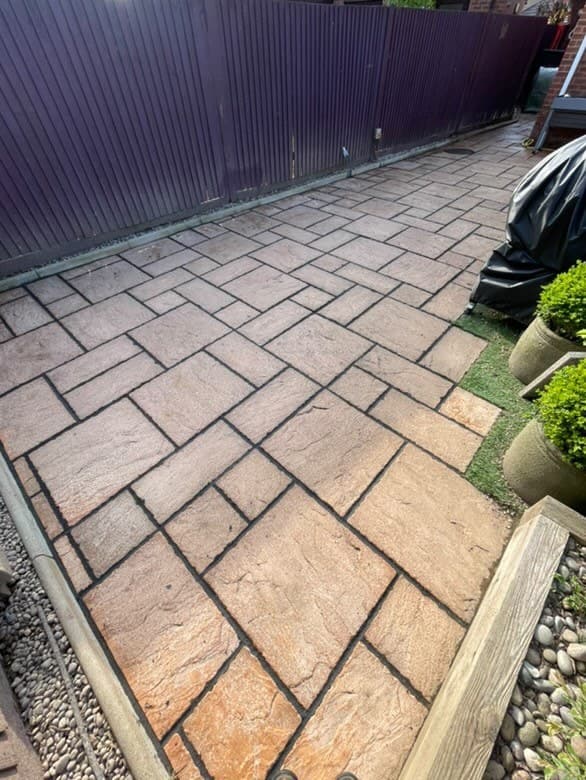 Repointed paving with the block borders cleaned up