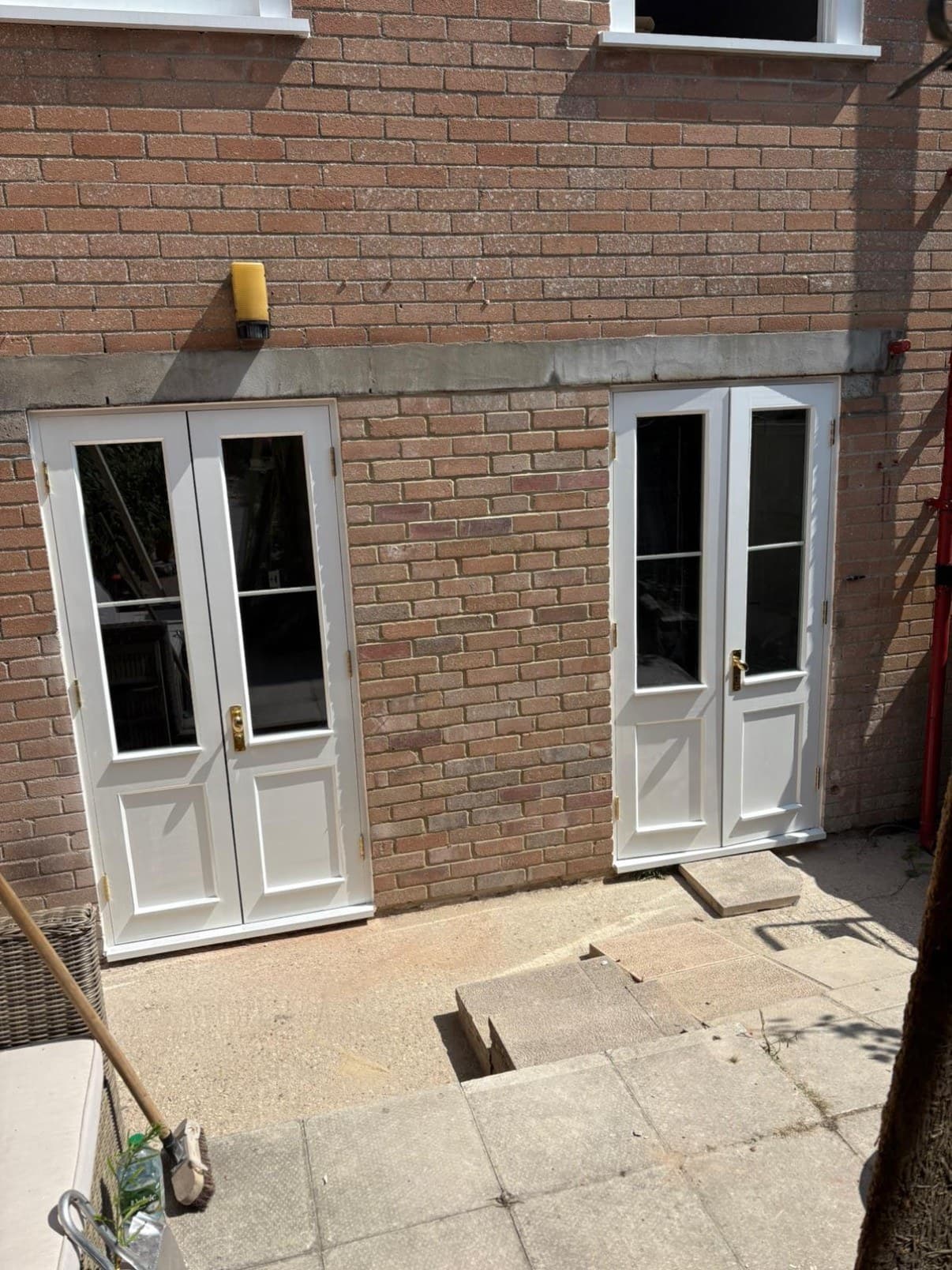 The rear elevation finished, with new French doors set into the brickwork