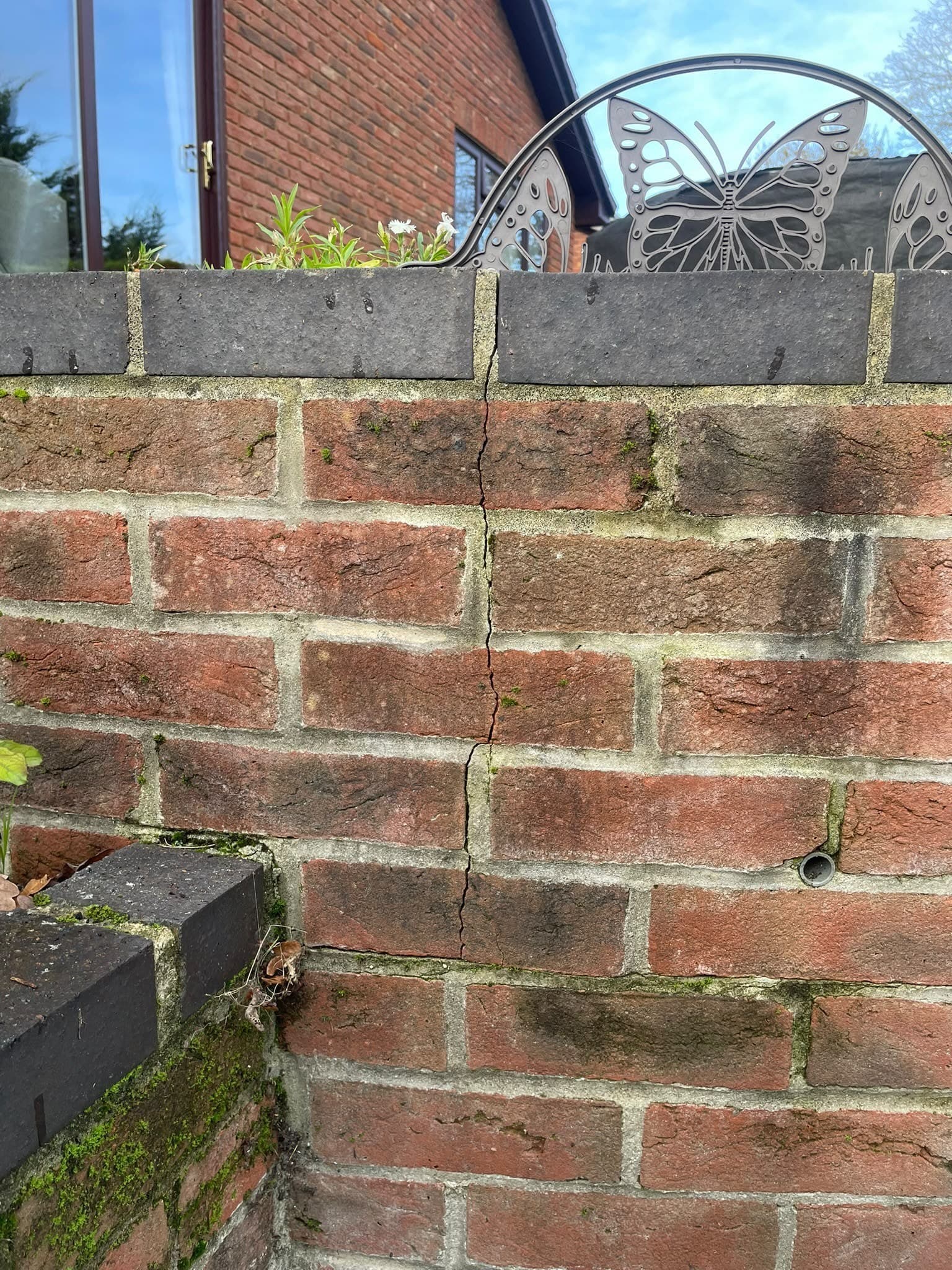 The wall of the planter is leaning or bulging